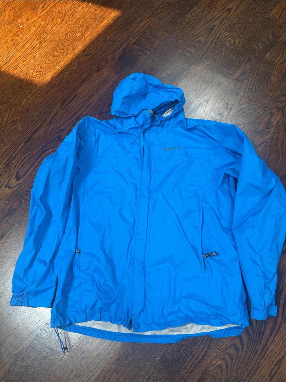 Marmot bright blue rain jacket size Large